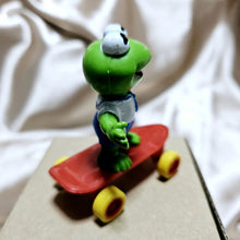 Load image into Gallery viewer, McDonald 1986 Muppet Babies -Kermit Frog &amp; Skateboard
